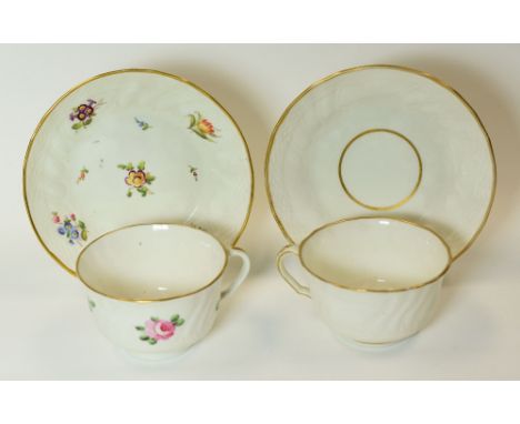 SWANSEA PORCELAIN - two cups and saucers, both moulded with basket-weave and swirls, one with simple gilt borders, the other 