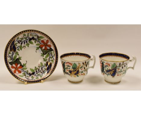 ATTRRIBUTED TO SWANSEA PORCELAIN - two cups and single matching saucer in blue Imari style decoration, red Swansea script to 