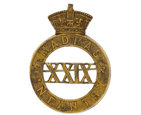 Indian Army. 29th Madras Infantry Victorian pagri badge circa 1885-93.  A good scarce British made die-stamped brass example.