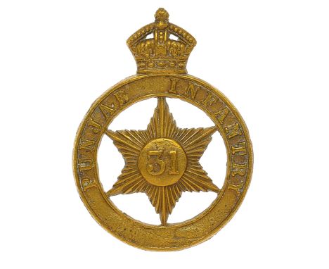Indian Army. 31st Punjab Infantry pagri badge circa 1901-03.  An Indian made cast brass example.  Crowned “PUNJAB INFANTRY” c