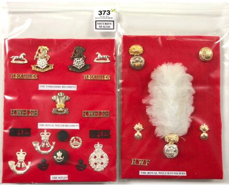 2 cards of Yorkshire, Royal Welsh Regiment R. Welch Fusiliers and Rifles insignia.  A good selection of mainly anodised cap b