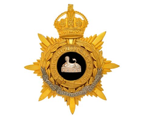 East Lancashire Regiment Officer’s helmet plate circa 1901-14.  A fine rich gilt example. Crowned star mounted with laurel sp