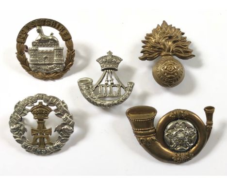 5 Victorian cap badges.  Dorsetshire ... Durham Light Infantry ... Royal Fusiliers ... Yorkshire Regiment ... King’s Own Ligh