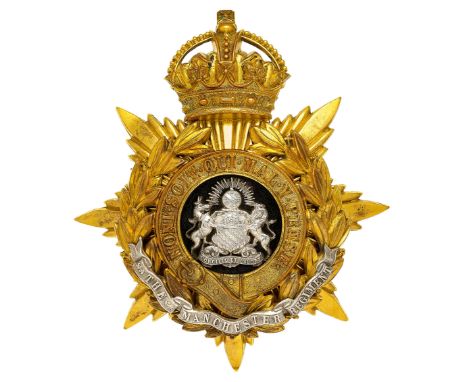 Manchester Regiment Officer’s helmet plate circa 1901-14.  A good gilt example. Crowned star mounted with laurel sprays and G