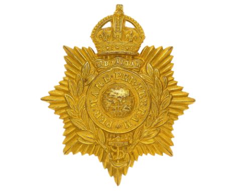 Royal Marines Senior NCO’s helmet plate circa 1923-52.  A good die-stamped rich gilt example. Crowned star bearing laurel spr