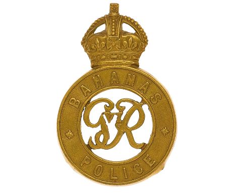 Bahamas Police GVIR helmet badge.  A good die-stamped brass example. Crowned title circlet with GVIR cypher to voided centre.