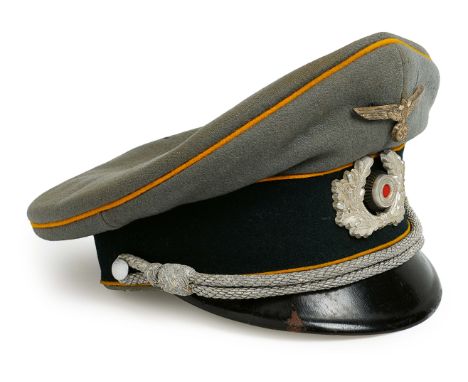 German Third Reich Cavalry Officer’s cap by E.Schluter Nacht.  A good pre-war style example. Grey cotton material, with dark 