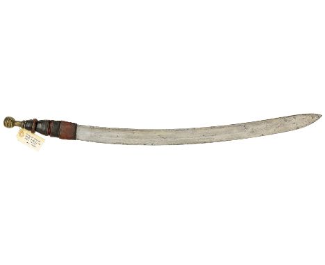 19th Century Sudanese Short Sword.  This example with a flat single edged curved 24 inch blade. The hilt with leather grip an