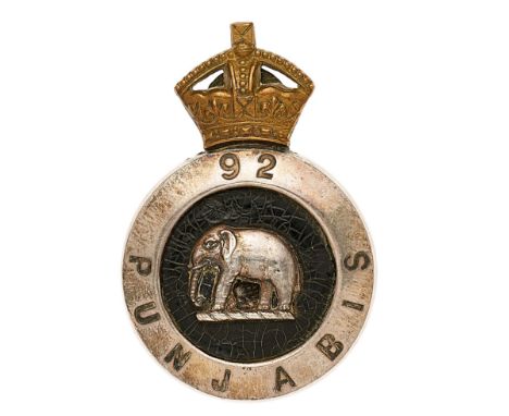 Indian Army. 92nd Punjabis Officer’s pouch badge circa 1903-22.  A very scarce example. Gilt Imperial crown over a silvered q