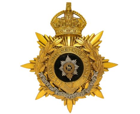 The Worcestershire Regiment Officer’s helmet plate circa 1901-14.  A fine gilt example. Crowned star mounted with laurel spra