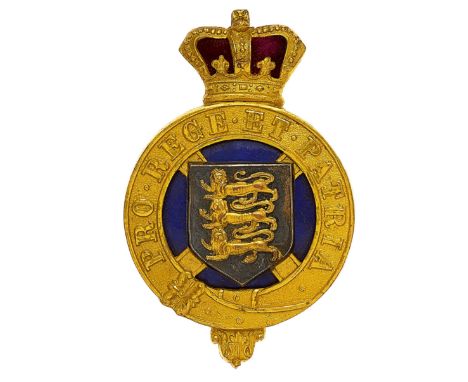 Royal Jersey Light Infantry Victorian Officer’s glengarry badge circa 1885.  A fine and rare gilt example. Crowned gilt strap