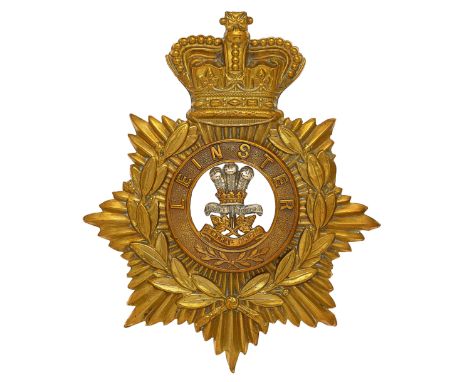 Irish. Leinster Regiment Victorian OR’s helmet plate circa 1881-1901.   A good die-stamped brass example. Crowned star bearin
