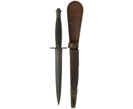 WW2 Period 3rd Pattern Fairbairn-Sykes Parkerised “42” Commando fighting knife.  A good example. The oval cross guard is stam