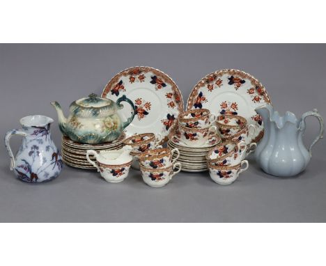 A late Victorian china floral decorated forty-piece tea service (settings for twelve), part w.a.f.; together with a floral de