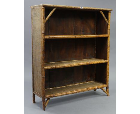 A late 19th/early 20th century bamboo &amp; woven-cane three-tier standing open bookcase, 35¼” wide x 41¼” high x 11½” deep.