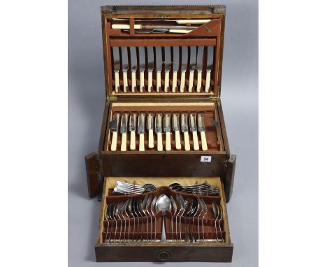 A part canteen of plated &amp; stainless-steel cutlery comprising of sixty-two items, &amp; in an oak case; &amp; a set of Ha