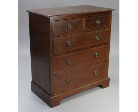 An Edwardian inlaid-mahogany small upright chest fitted two short &amp; three long graduated drawers with brass ring handles,