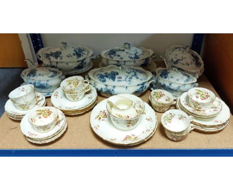 A late Victorian china floral decorated thirty-seven piece part tea service; a blue &amp; white floral decorated part dinner 