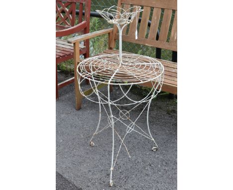 (LATE ADDITION) A white painted wire-work garden plant stand; 19" diam. x 38" high.