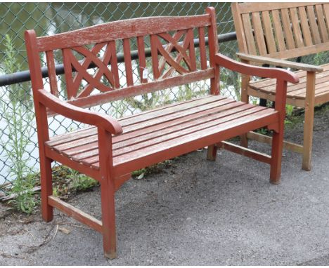 (LATE ADDITION) A stained wooden garden bench; 47" wide.