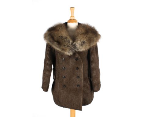 A Louis Vuitton wool and silk coat.
With mink and pekan collar, with dark brown and light brown stripe, double breasted, with