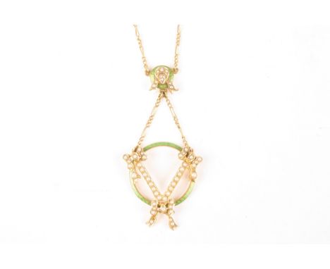 An Edwardian 15ct gold, seed pearl and green enamel pendant
formed as a trio of ribbons on a green enamel loop, suspended fro