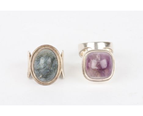 A Sterling silver and amethyst ring by O.U.Bohlin
together with another Swedish silver ring. (2)
Dimensions: Sizes M & J.Cond