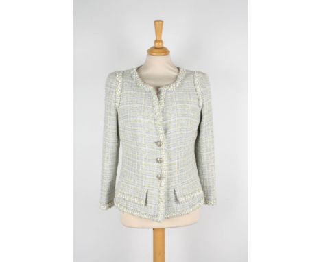 A Chanel grey checked boucle jacket.
with lime and white checked pattern, with white, grey and lime raised flower trim, three