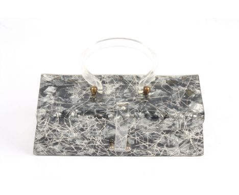 A rectangular shaped ladies Lucite handbag formerly belonging to Daphne Guinness
with perspex handle and fasteningDimensions: