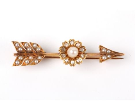 A Victorian diamond and seed pearl bar brooch
in the form of an arrow, the shaft set with a pearl and diamond flower head, th