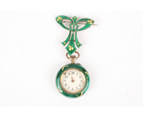 An Edwardian ladies silver gilt and green enamel pendant fob watch
the engine turned green enamel decorated with gilt flowers