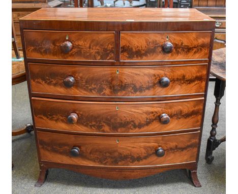 An Early 19th century Mahogany Bow Front Chest of Two Short Over Three Long Drawers, with caddy top, boxwood stringing, raise