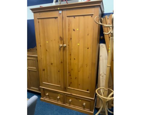 A pine double wardrobe with two drawers H 200 cm W 128 cm. S/D 