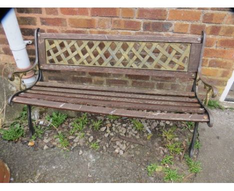 A cast iron and hardwood garden bench 