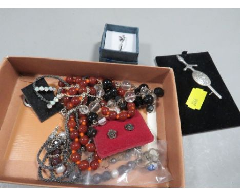 A small quantity of jewellery to include silver Celtic brooch, silver and opal earrings, silver rings etc