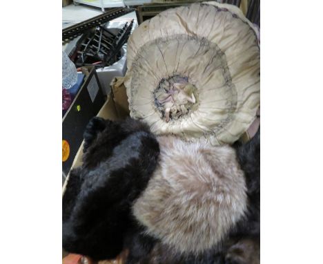 A tray of vintage furs to include a ceramic doll pillow 
