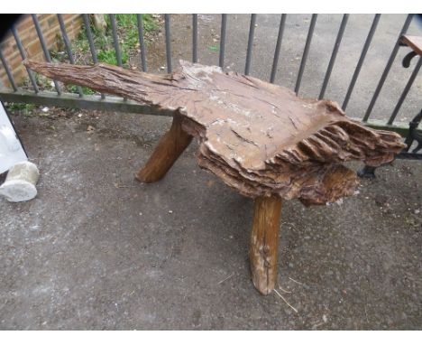 A driftwood garden bench 