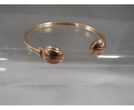 A hallmarked 9 carat gold bangle approx weight 6.4g 