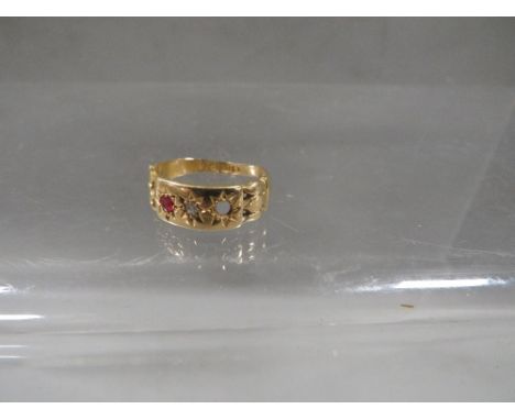 A Chester hallmarked 18 carat gold ruby and diamond set ring - one ruby missing and band very worn and thin at base ring size