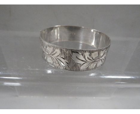 A hallmarked silver clasp bangle 