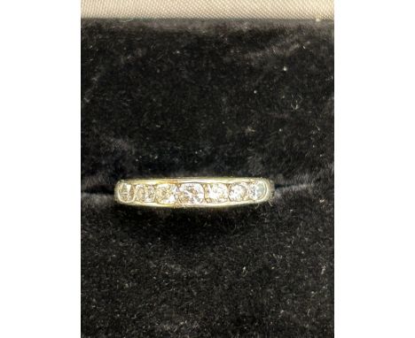 9ct white gold half eternity ring set with 7 white gemstones, size K