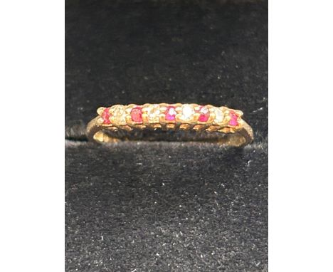 9ct Gold ring set with rubies & diamonds Size K 1.2g 
