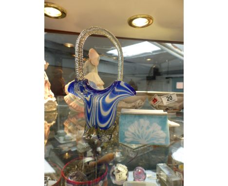 Small blue glass basket and ceramic menu holder