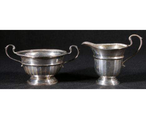 Silver sucrier and cream jug of faceted circular form, Birmingham, 192g gross