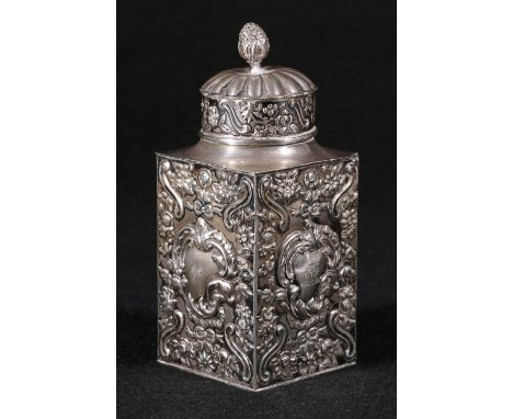 Silver tea caddy of embossed square form, maker William Comyns, Goldsmiths and Silversmiths Company, 135g, 12cm