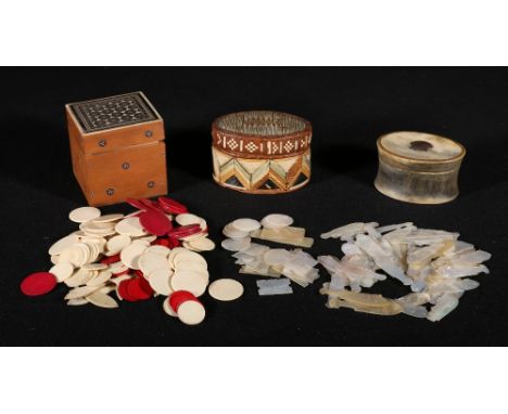 Three boxes containing a quantity of games counters, inlaid sandlewood box, straw work box and an oval horn box with silver b
