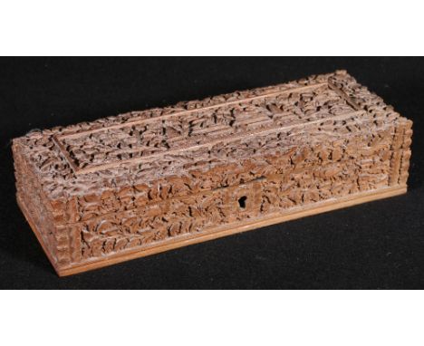 19th century Indian heavily carved sandlewood box depicting an architectural panel on a dense ground of birds and foliage, 11
