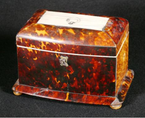 Regency bowfront tortoiseshell and ivory tea caddy with two lidded compartments on bun feet, 12cm CONDITION REPORT: Ivory pan