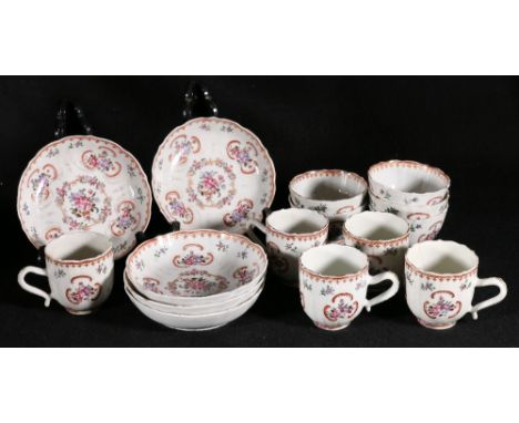 Set of Chinese famille rose teabowls and saucers and coffee cups, each decorated with flowerheads and garlands, with white sl