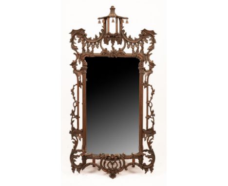 A Chinese Chippendale style wall mirror, the carved frame with a pagoda top, 90cm x 50cm CONDITION REPORT: Condition informat
